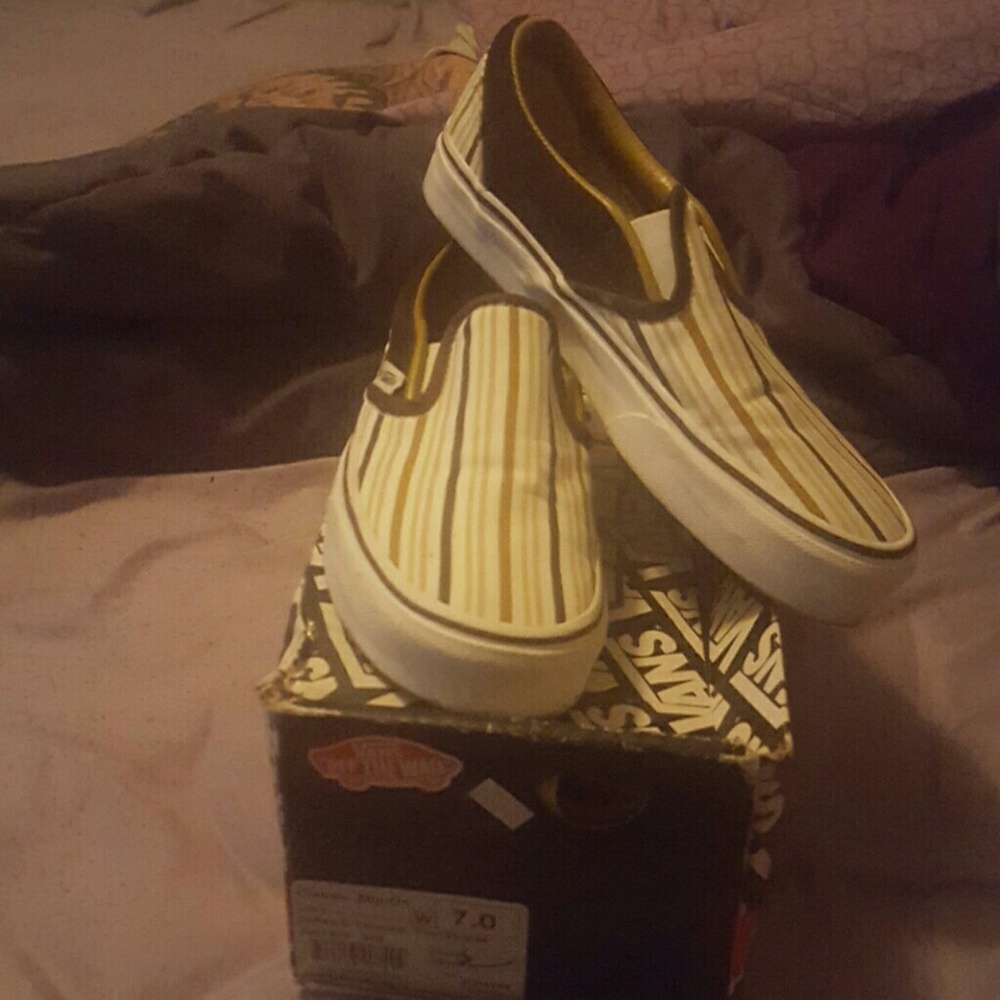 Brown and tan Vans