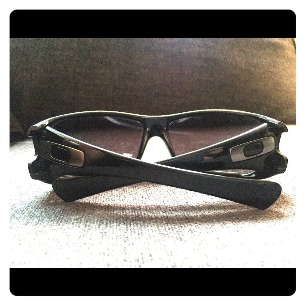 Black Oakley Antix sunglasses.