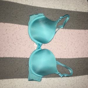 A light blue Victoria's Secret size 32B bra