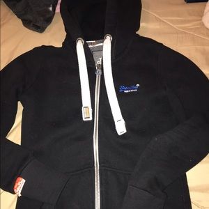 Women Superdry orange label.