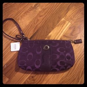 Plum purple coach wristlet/purse