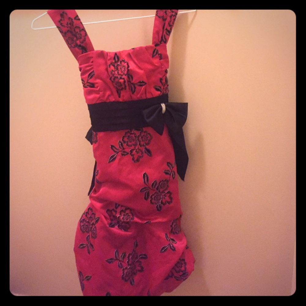 Red and black dress with a beautiful flower design