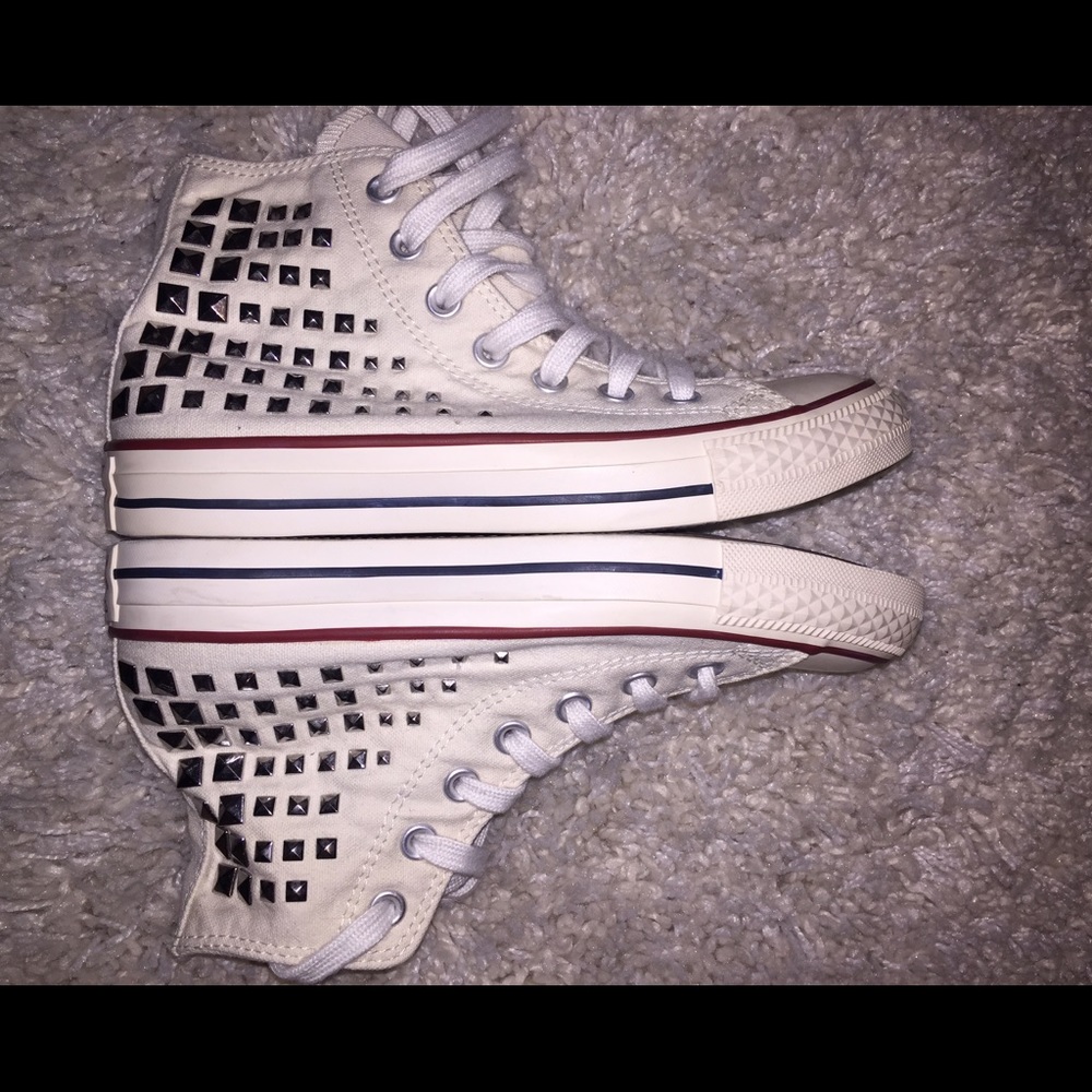 Converse high top studded Chuck Taylor's.