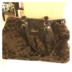 Brown coach purse.