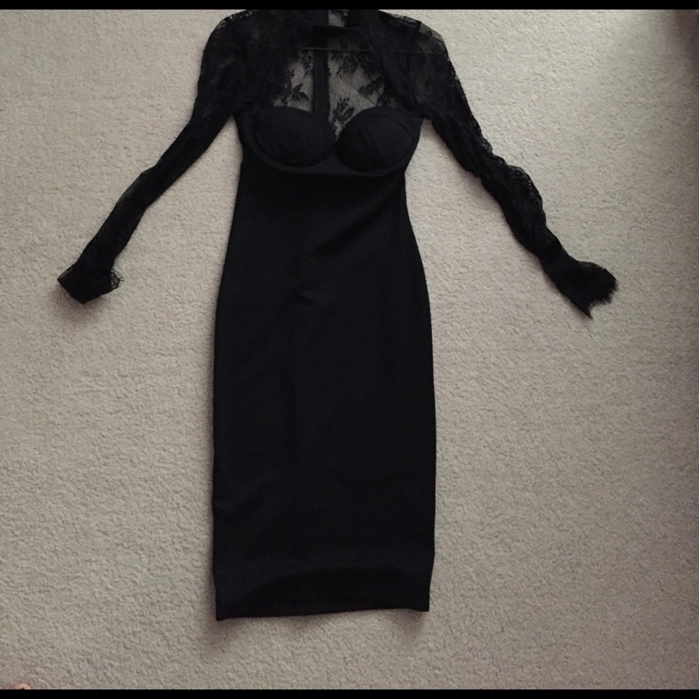 Black dress never worn.