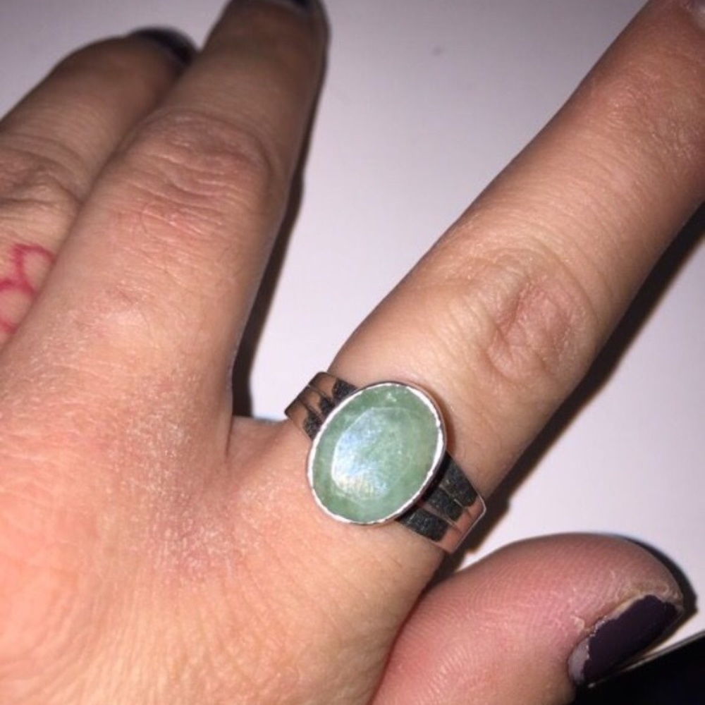 All real Selenite sterling silver ring .