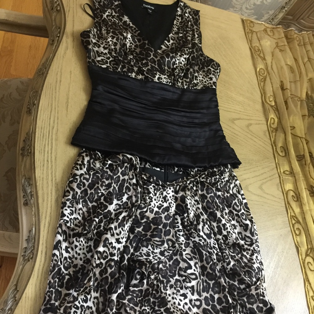 BEBE leopard silk top with a matching ruffle skirt