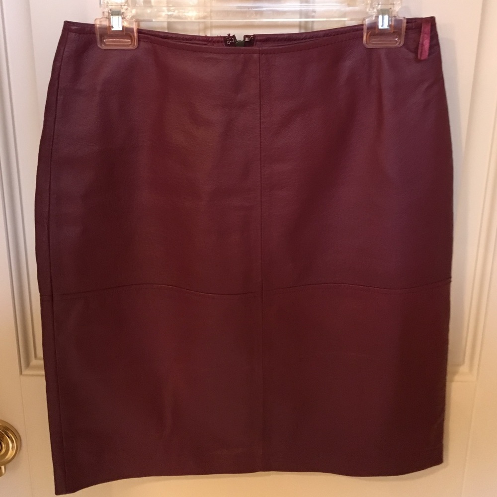 Burgundy leather skirt.