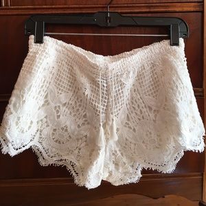 White lace crocheted shorts.