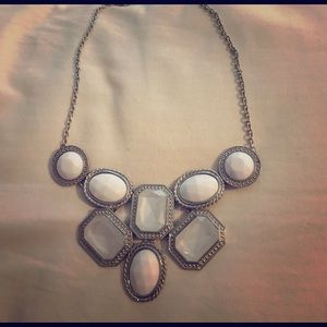 White and silver colored necklace!