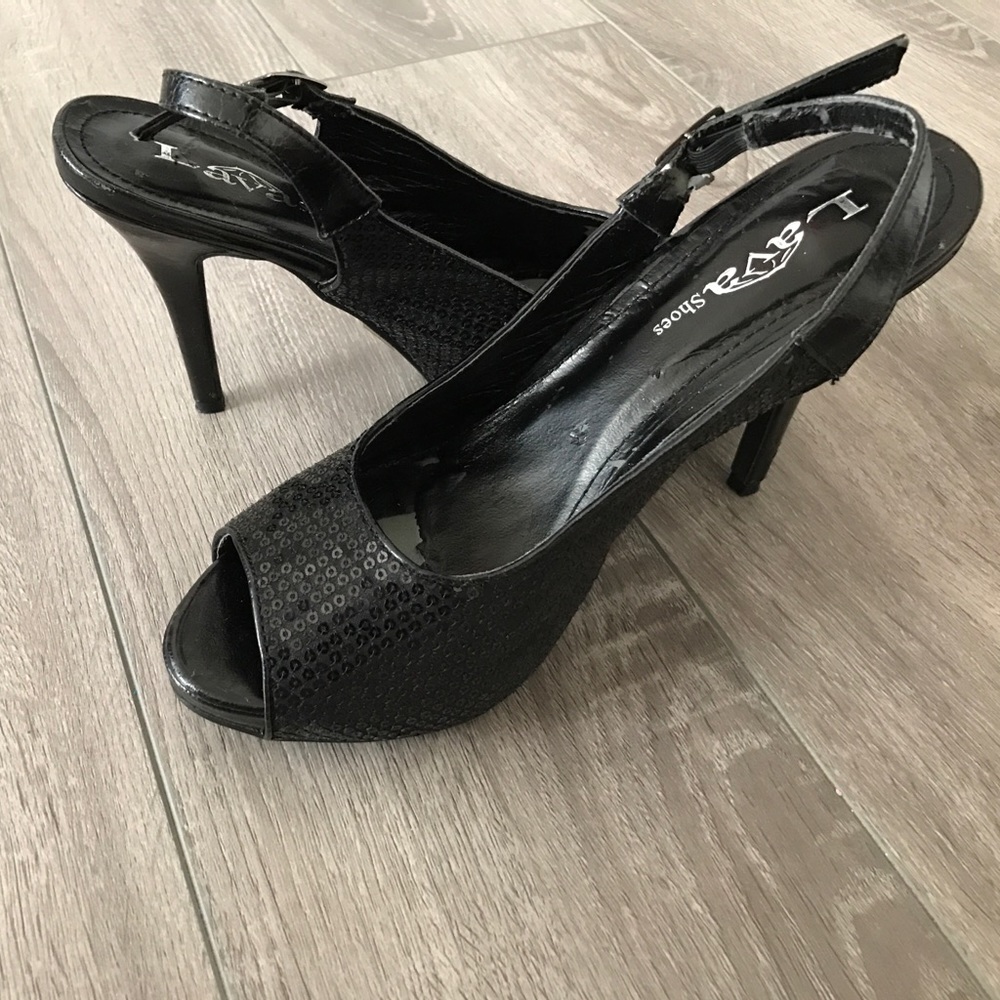 Black sequence pumps by Lava worn once