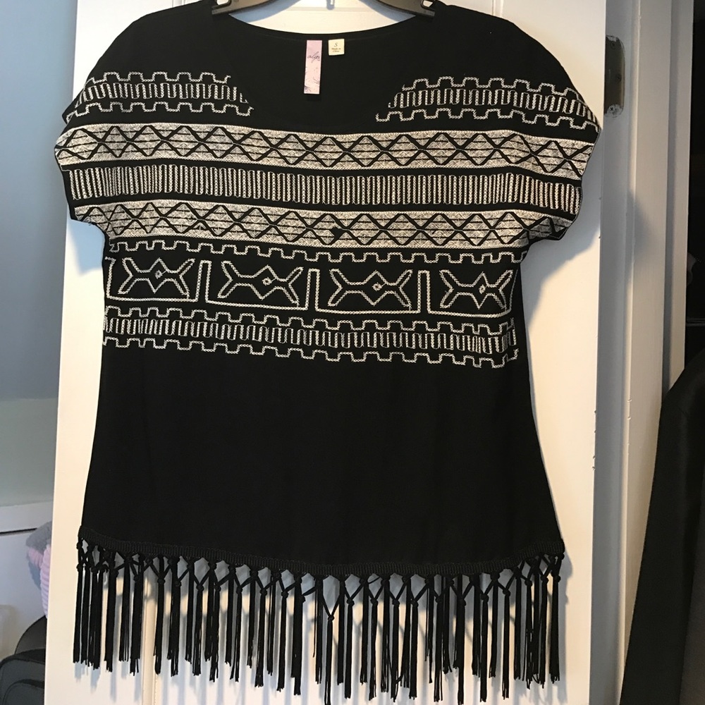 Loose fitted tribal fringe top