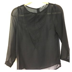Sheer black blouse with cute detailing!
