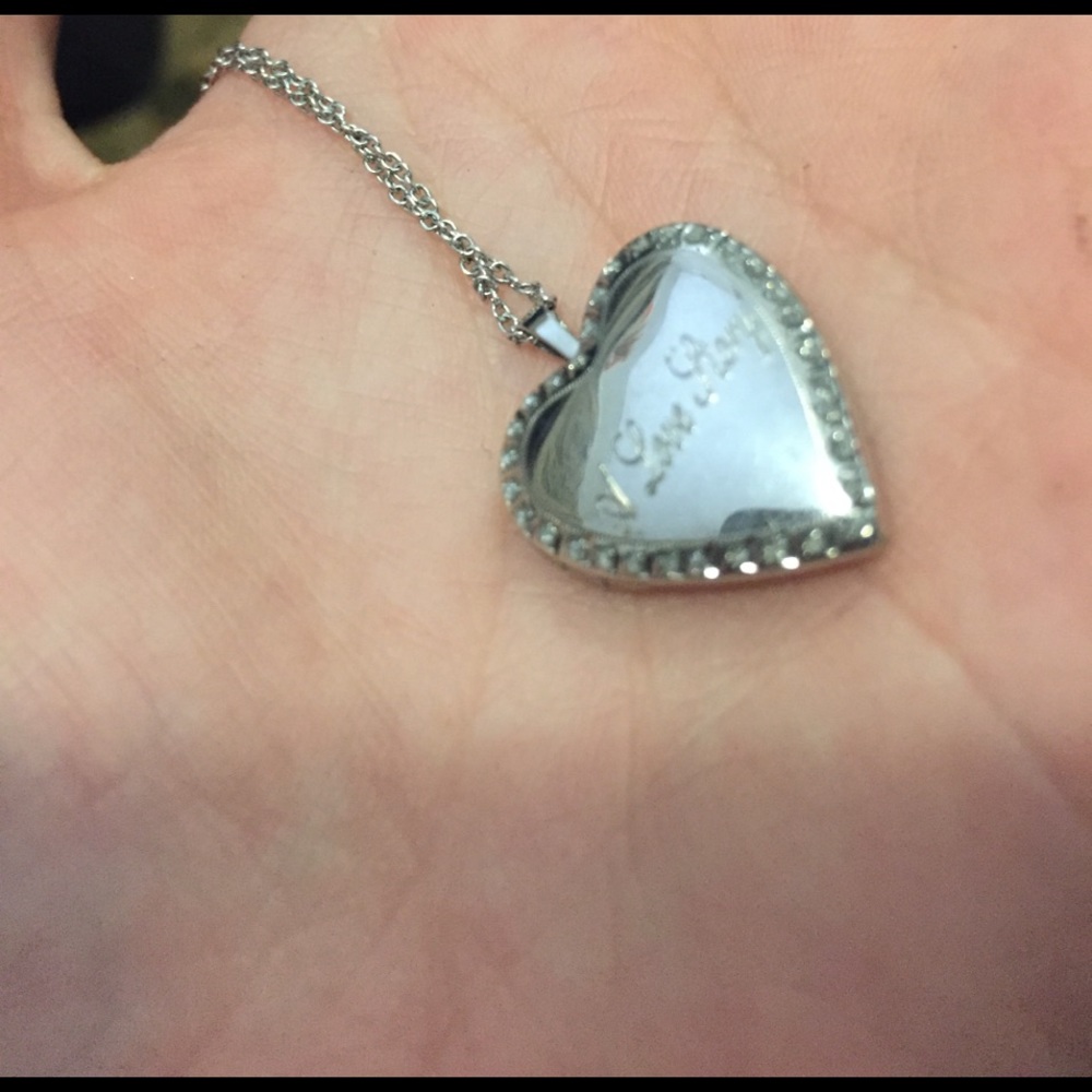 Silver, "a love story" locket.