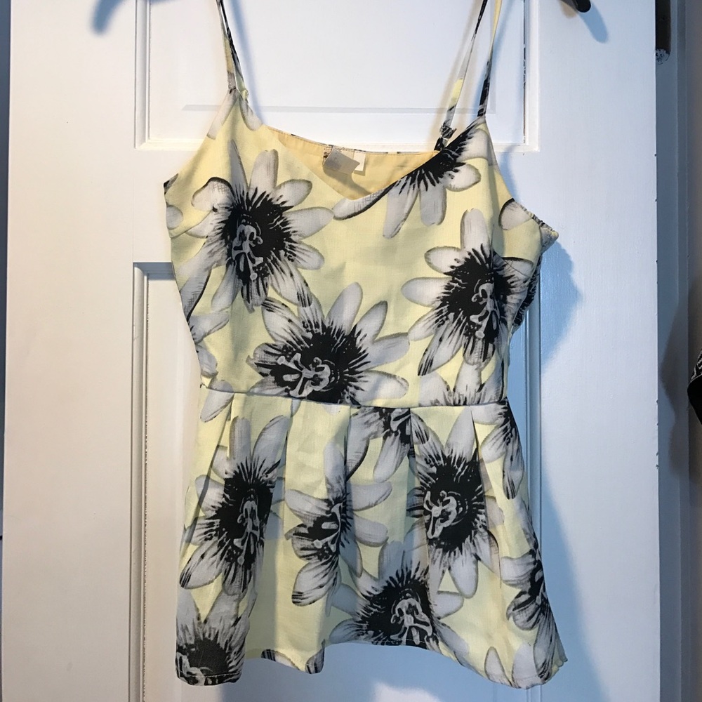 Pale yellow daisy peplum top