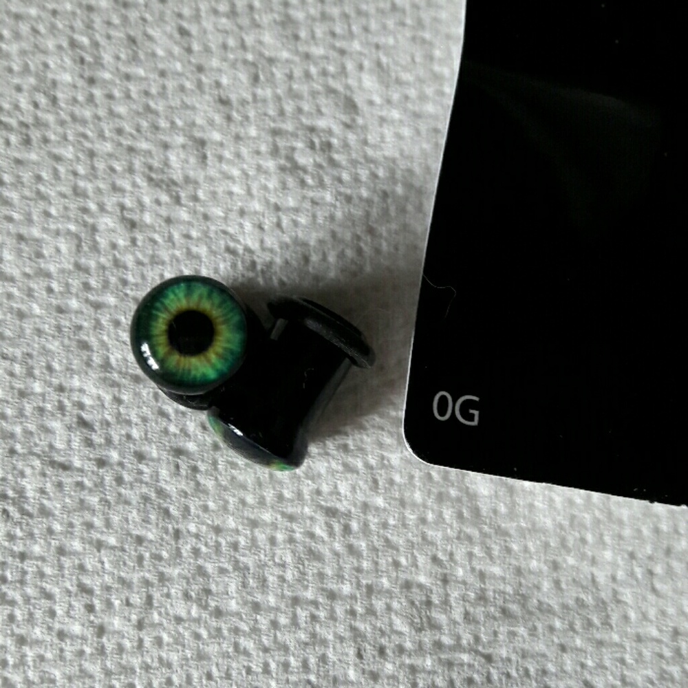 0 gauge acrylic eyeball ear plugs.