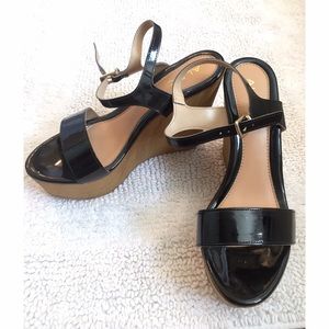 Black patent wedges by Aldo
