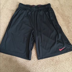 Nike Dri-Fit shorts. Black and red.