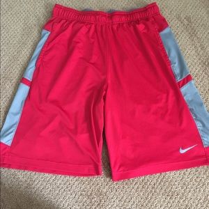 Nike Dri-Fit training shorts. Red and gray.