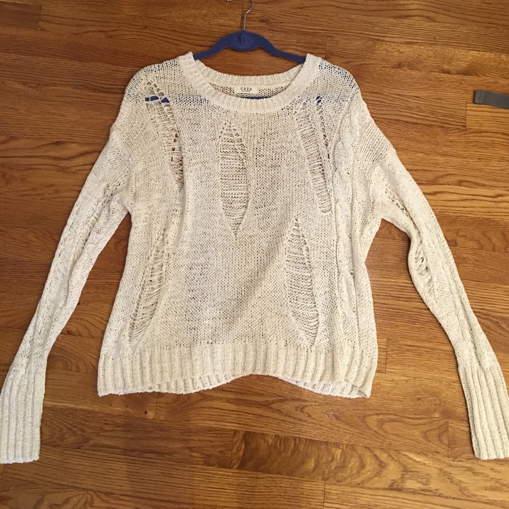 Ripped up style sweater