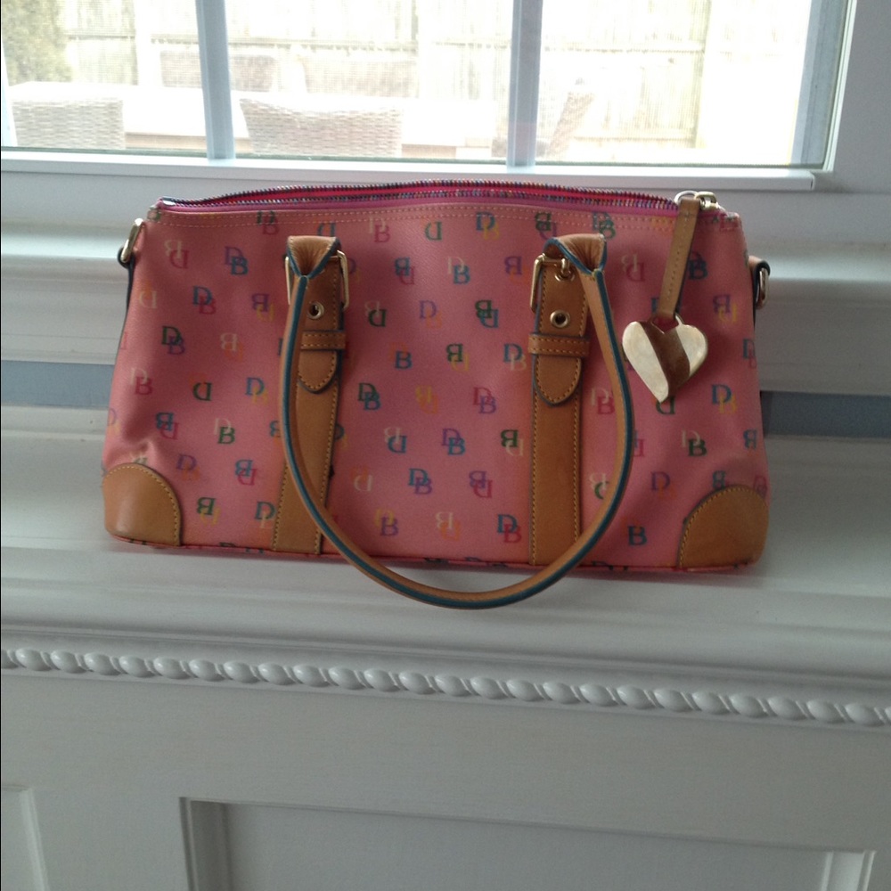 Pink monogram Dooney and Bourke handbag.