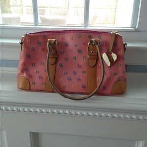 Pink monogram Dooney and Bourke handbag.
