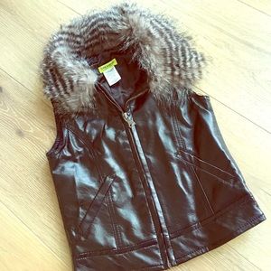 Gorgeous girls faux leather/raccoon vest
