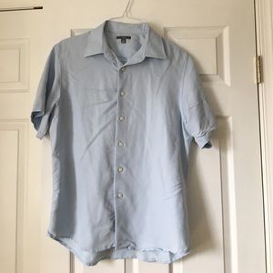 Light blue short sleeve button down shirt.