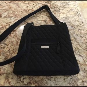 Black micro fiber Vera Bradley cross body purse.