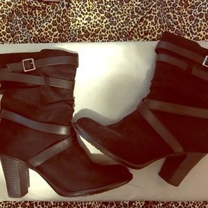 Black mid calf boots for women . Lightly used .