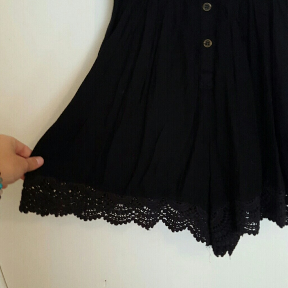 Black romper with lace trim