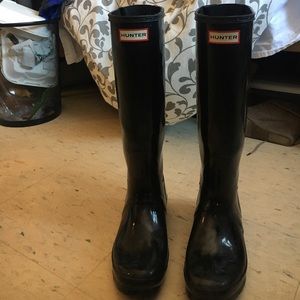Tall black hunter rain boots