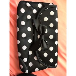 Black and white polka dotted makeup bag
