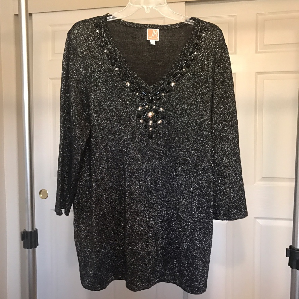 Woman's plus size embellished sweater