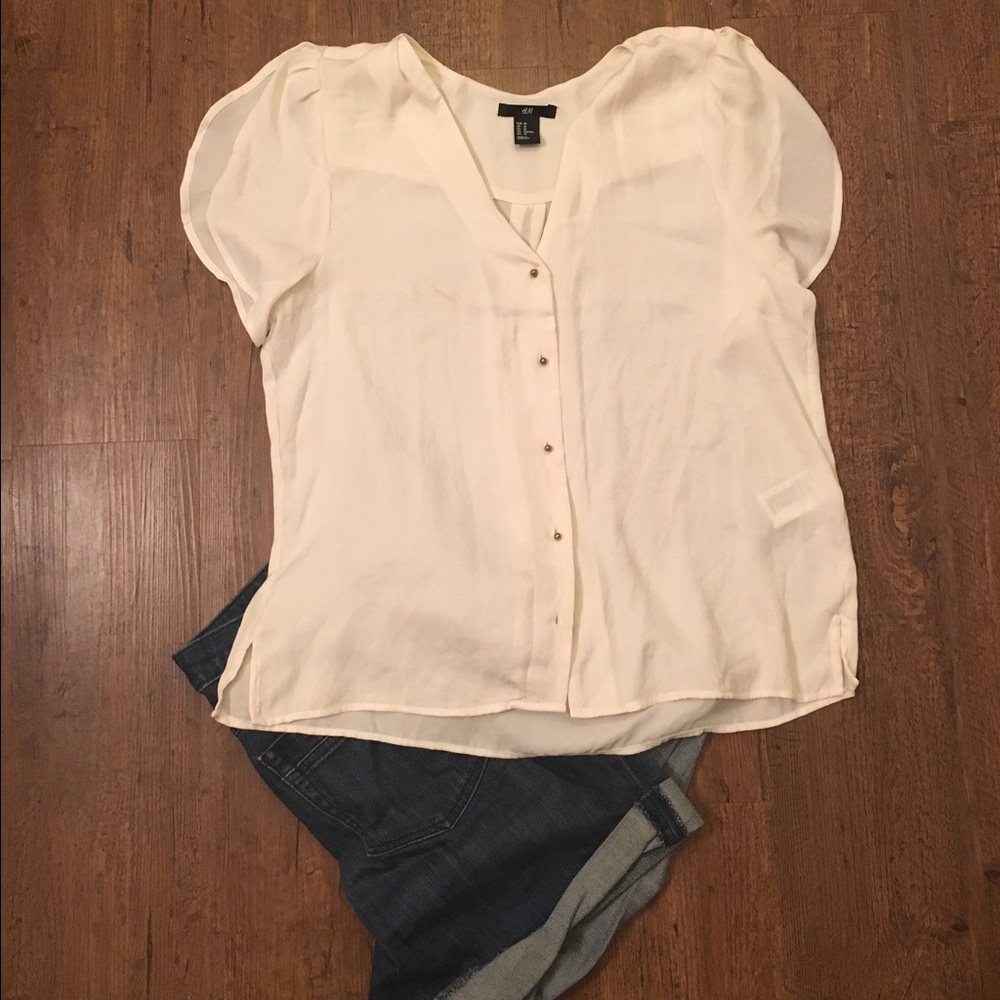 White flowing short sleeve button up blouse
