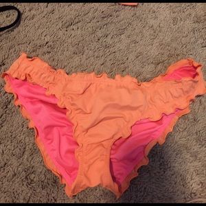 Bright orange Victoria secret bikini bottoms