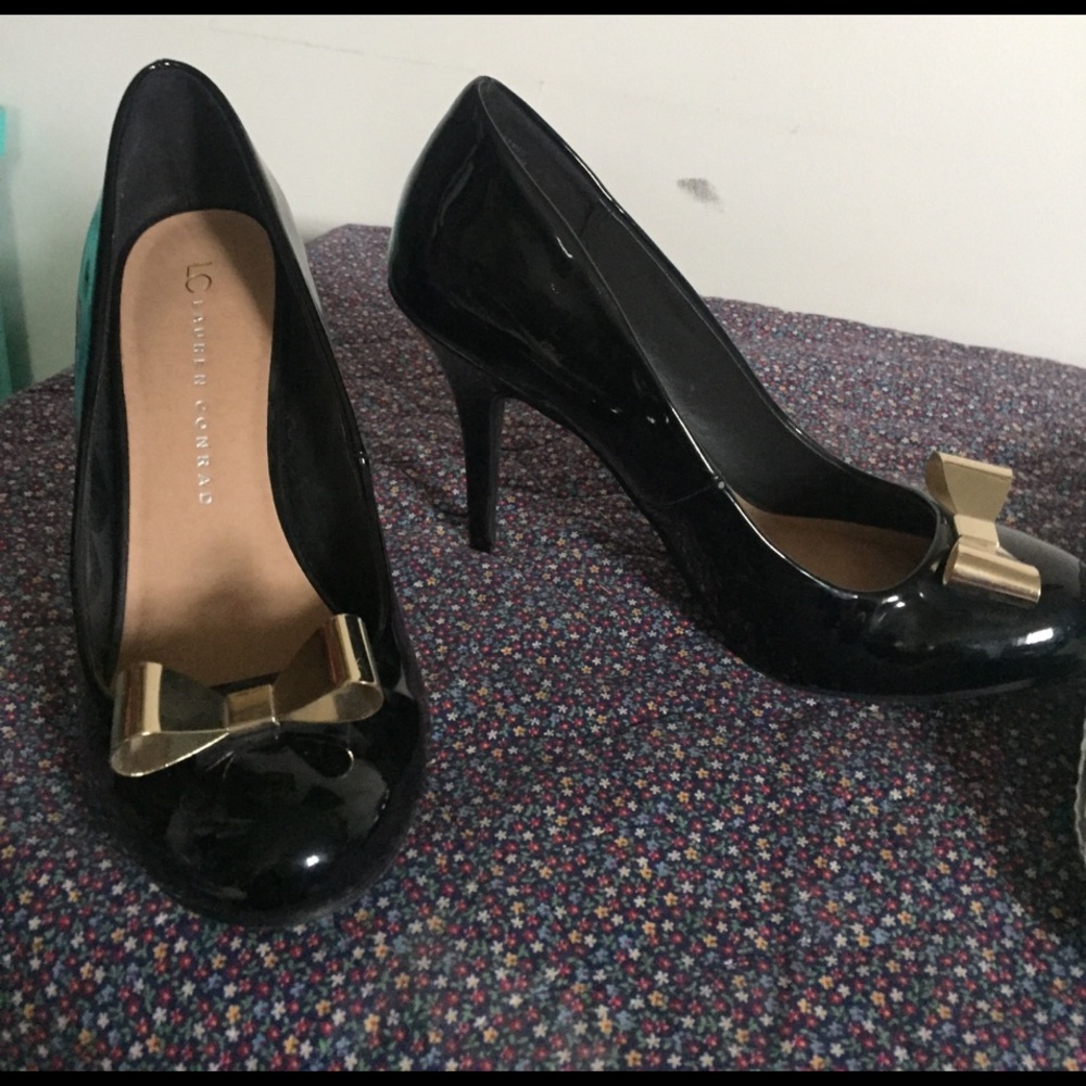 LC black heels with gold bows