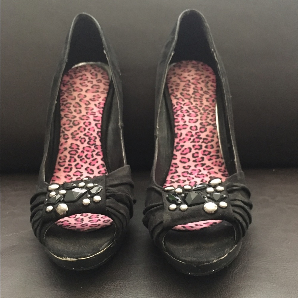Black suede pumps