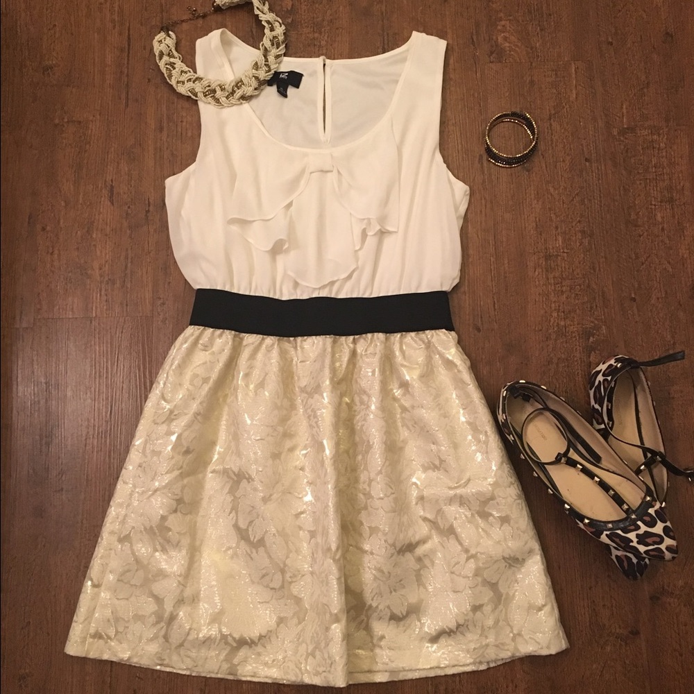 Black, white and gold dress