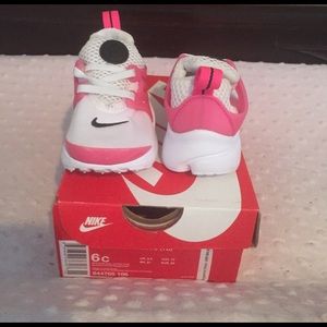Nike pink & white size 6 shoes for toddler