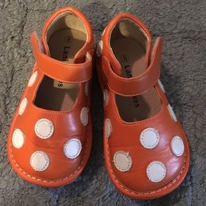 Orange and white shoes