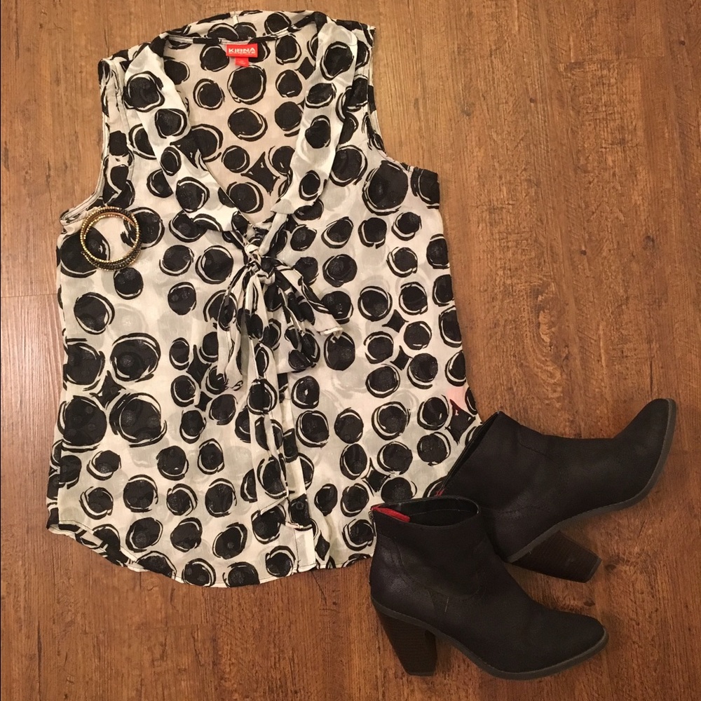 Sleeveless blouse with bow tie neckline