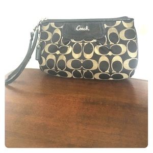 Black and white Coach wristlet/ wallet