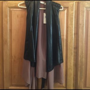 Black Faux leather vest, costs Blanca