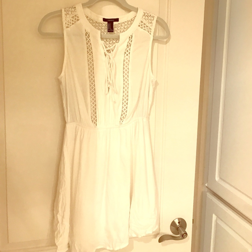 Cute white mini dress. Never worn!