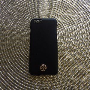used Tory Burch IPhone 6 case. Small tarnishes