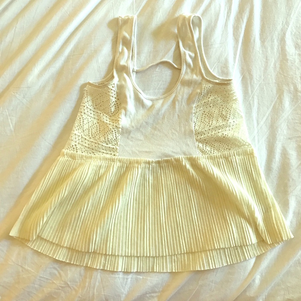 White blouse with cut out patterns