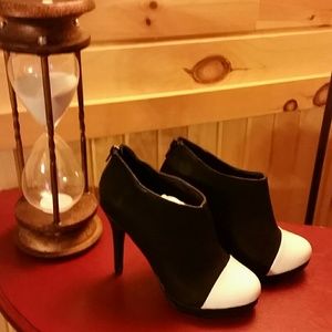 Black and White High Ankle Shoes....