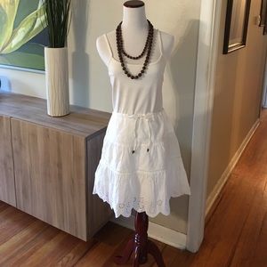 Cute white skirt with feminine eyelet design.