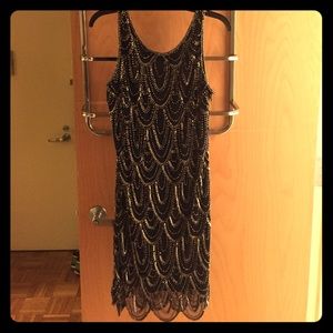 Elegant navy cocktail dress with sequins